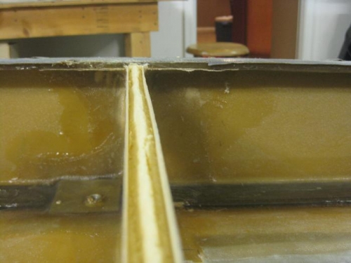 Chamfer cut out of foam in C Rib