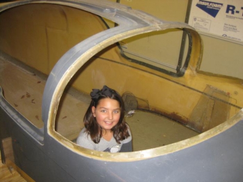 Lindsay at home in co pilot seat!