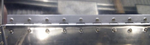 Hinge rivets....Looking Good...