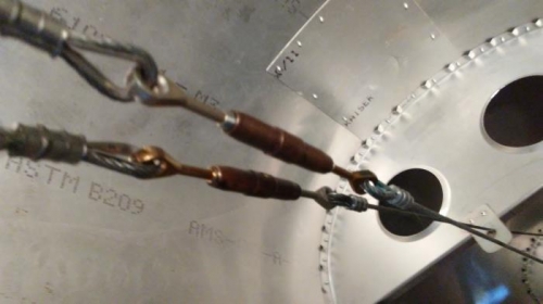 Turnbuckles connected in fuselage