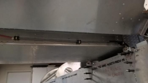 Wire routed between elevator and stabilizer