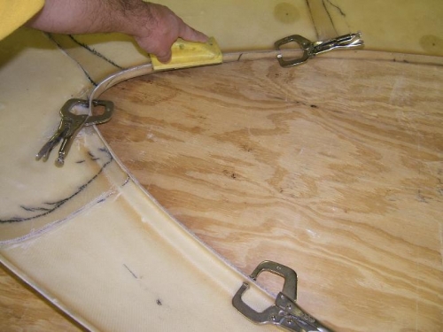 Sanding edges of the door frame