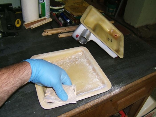 Sanding oil tank halves