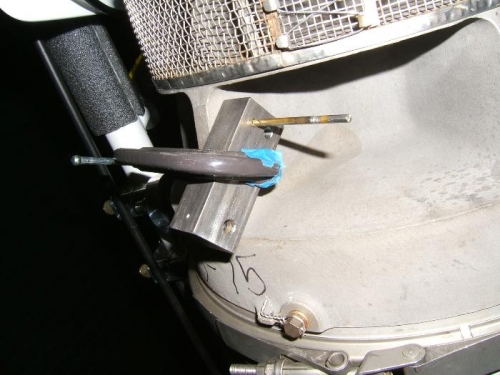 Using drill block to drill exciter mounting holes