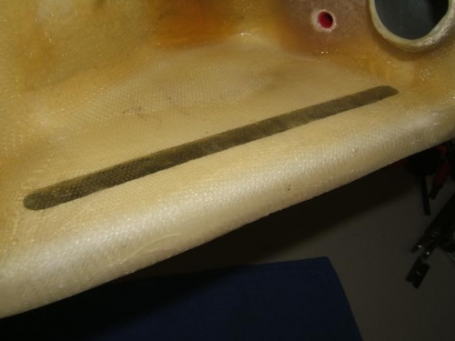 Thin coat of resin on inside of sight window