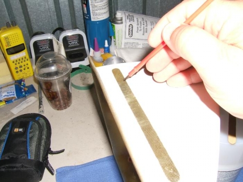 Thin coat of resin brushed onto outside of sight window