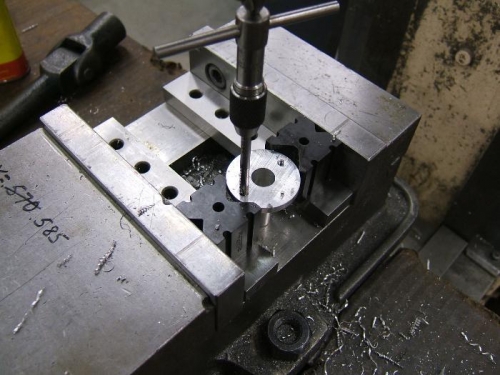 Tapping latch housing