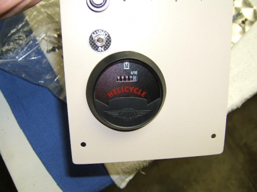 Hour meter in lower panel