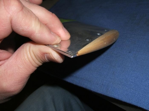 Raised skin at stab corner