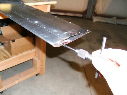 Tapping the fine balance hole