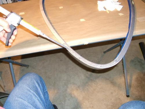 Applying epoxy to the door frame