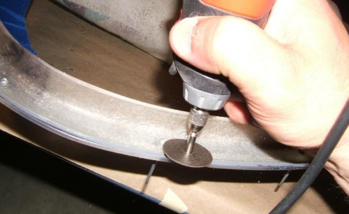 Grinding the rivets flush