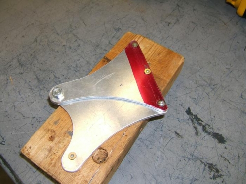 Preparing to cut lightening holes in the side frames