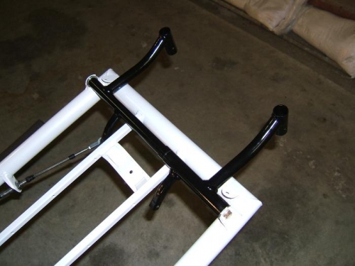Pedals mounted in frame