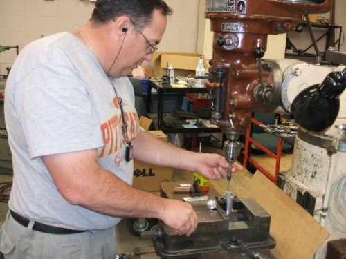 Tapping holes for potentiometer cover