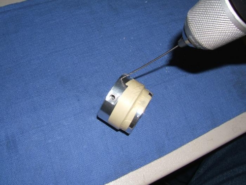 Drilling safety wire holes