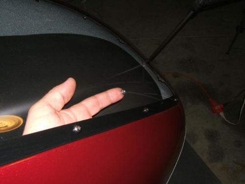 putting a nut on a hard to reach screw