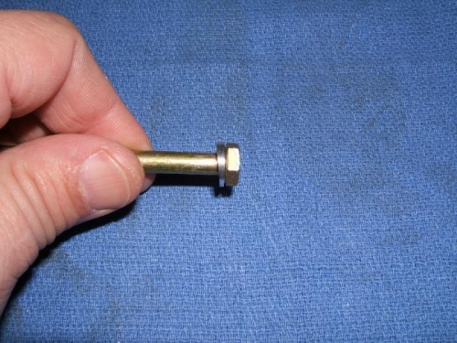 Custom tapered washer for long vertical fin bolt