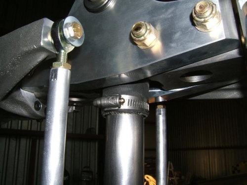 Teeter stop bumper secured