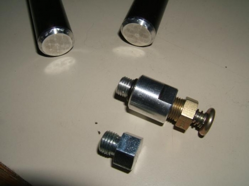 Pedal plugs and filter vent fitting