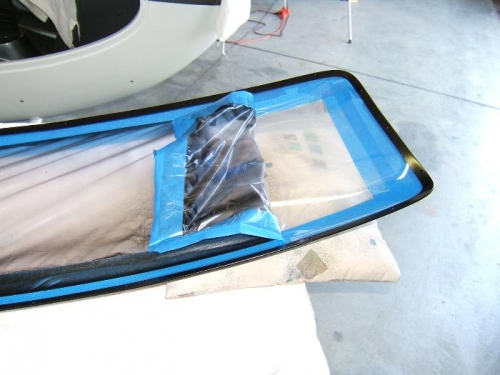 Removing the protective plastic from the windshield