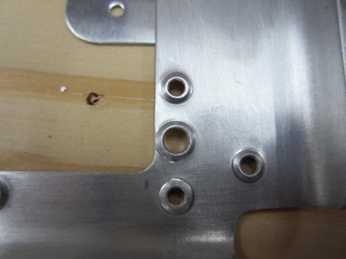 Reinforcement plate dimpled.