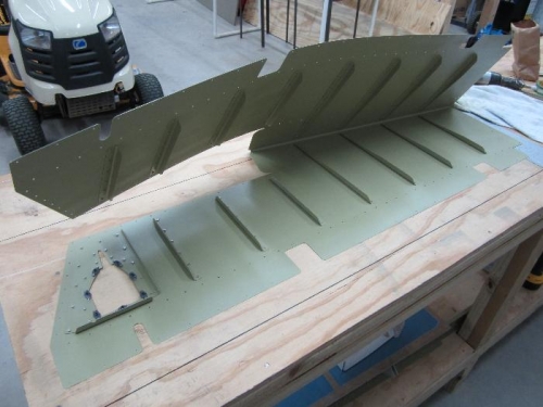 Trim reinforcement plate & stiffeners back riveted on.