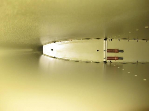 Inside look at HS-707 front rib riveted
