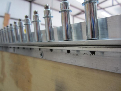 Sandwiched between two angles.