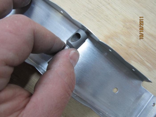 Deburring hard to reach holes