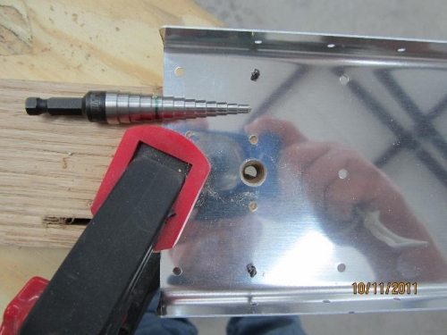 I used scrap wood clamped to the back