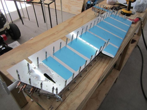 Final drilled left elevator skin.