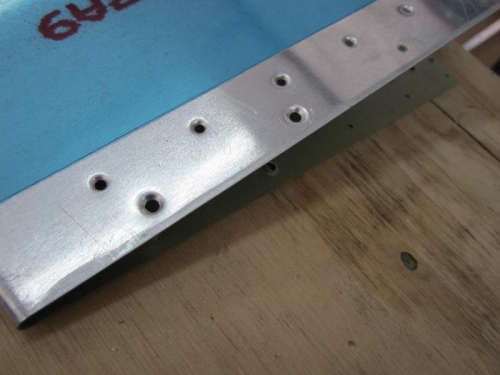 Dimpled last two holes for elevator tip.