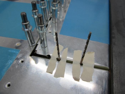 Aligning trim tab with left elevator.