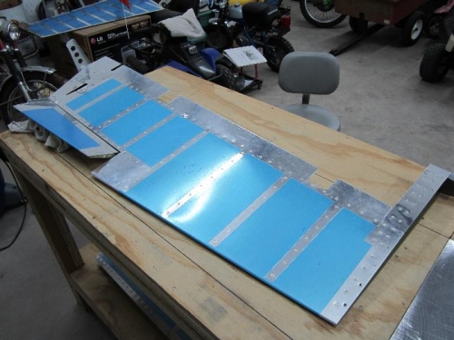 About 30 degrees down deflection.