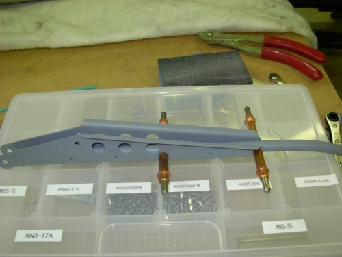 Assembling anti servo trim arm.