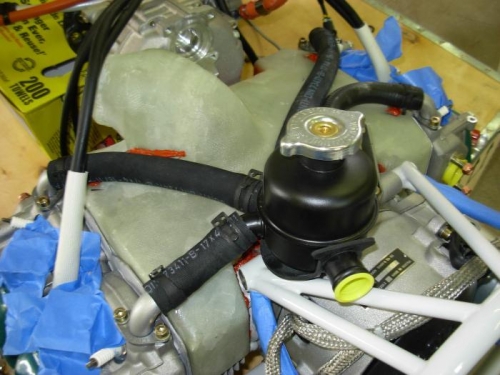 Intake manifold over shroud