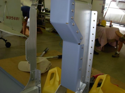 Riveted left and right caps and rollers