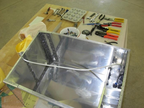 Fuel return line in tank