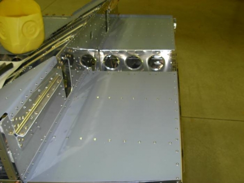 Riveted floor panels