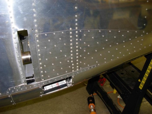 Riveted side skin doubler