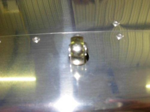 rod-end bearing in pivot bracket