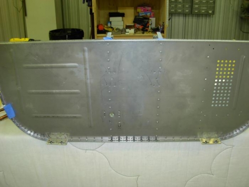 Attached nut plates to firewall
