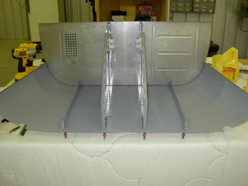 Riveted bottom and side skins