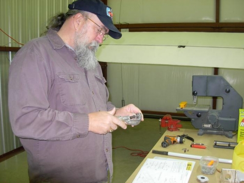 Jim working on counterbalance arm brackets.
