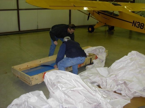 Unpacking and checking inventory.