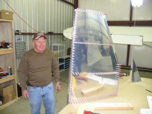 Attaching skin to stabilizer ribs