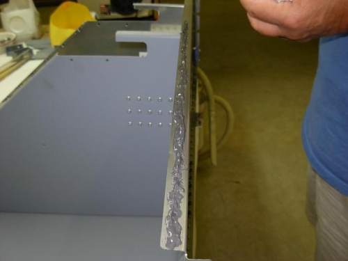 Proseal on top flange of firewall