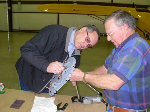 Ben Bradley holding bulkhead assembly while I pulled the rivets.