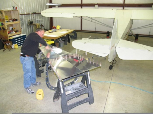 Preparing to attach ribs to bottom fuselage skin